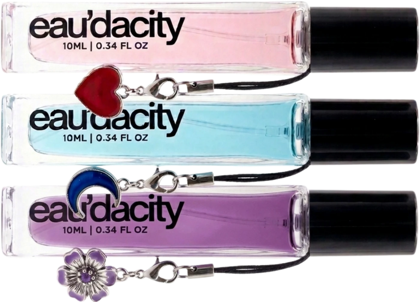 Three perfume rollers with small bottle charms